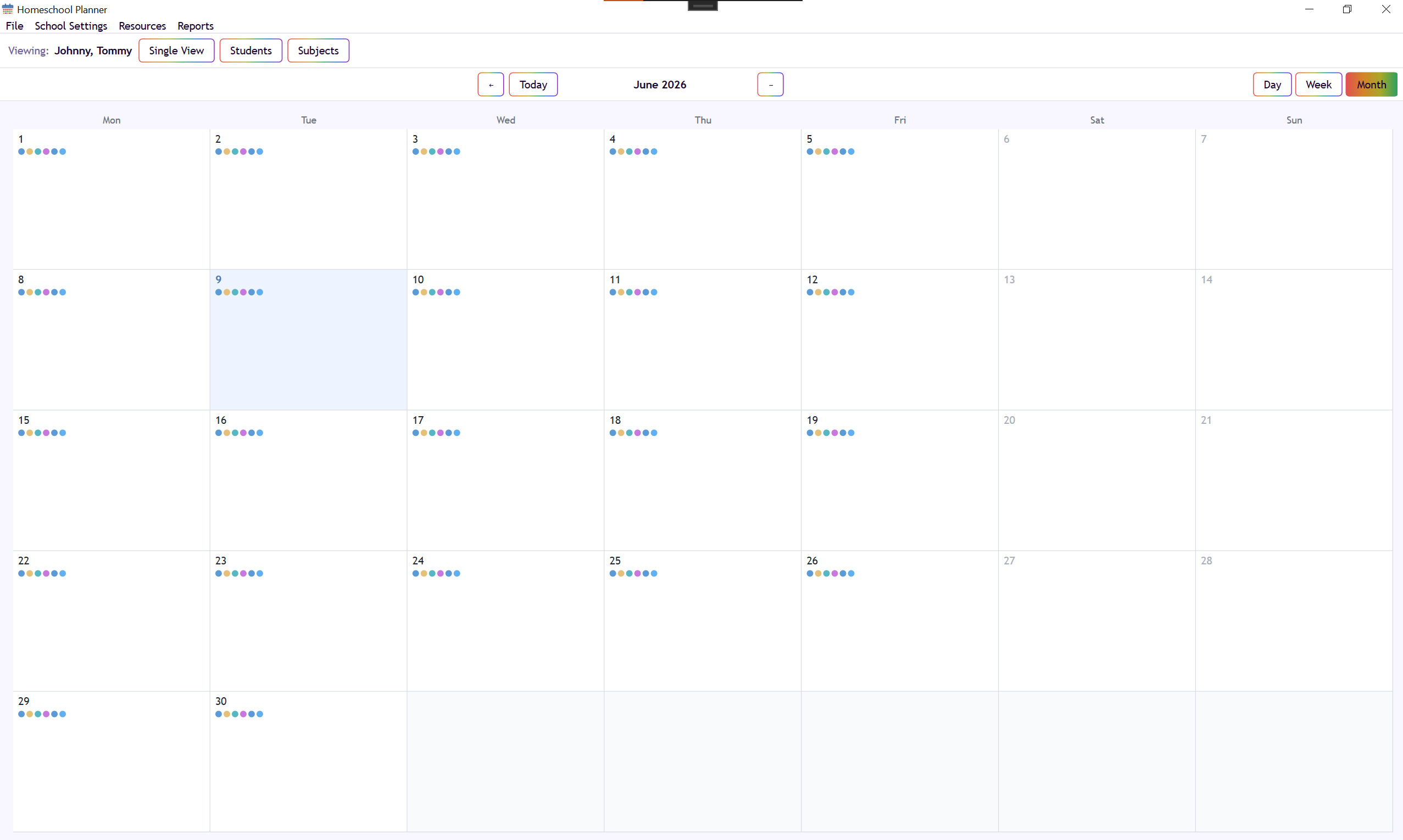 Homeschool Planner month view showing color-coded lesson dots across calendar days